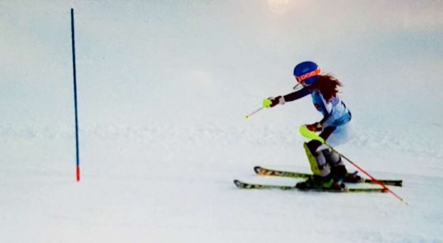 Stephanie Espino races down a slope in Cascade, Wisconsin. After competing against the 16u girls, she wants to improve and reach their level. “I want to get better so that I can ski anywhere without any limitations,” Espino said.