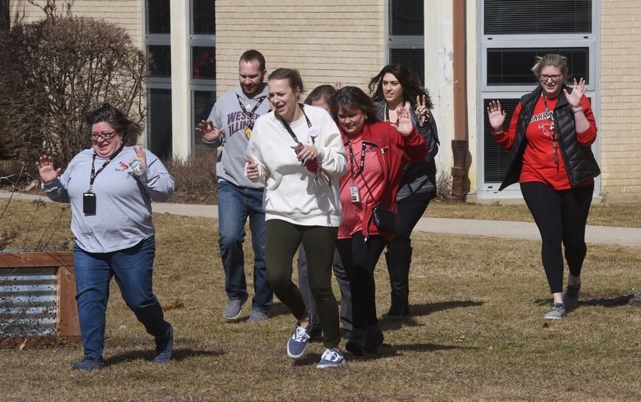 Barrington high school staff is shown above, participating  in the active shooter drill training. 