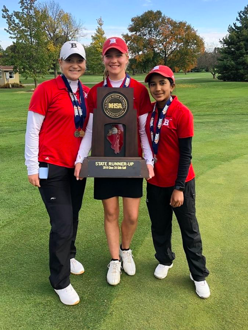 Barrington girls golfers, from left, Caroline Smith, Mara Janess and Sophia Sulkar display the Fillies Class 2A state runner-up trophy Saturday at Hickory Point Golf Club in Decatur. Janess won the individual championship, while Smith was tied for third and Sulkar tied for fifth.