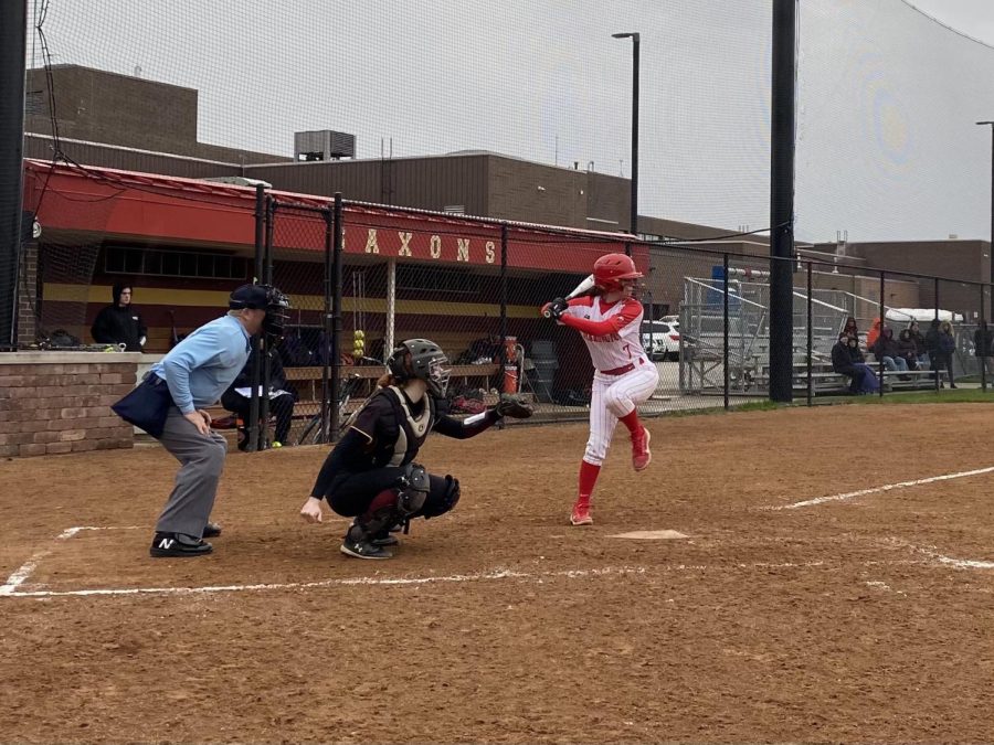 Sophomore Gabi Phillis prepares to swing at a pitch during the game against Schaumburg. Photo courtesy of Jessica Maggio.
