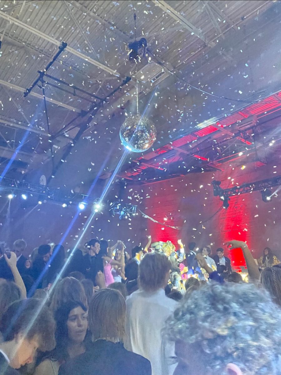 Students dance at the Homecoming celebration, with the disco ball adding more to the ambience. Sponsors Lisa Nardiello and Angela Concha were overall pleased with the turnout this year. (Photo Credits: Benice Udeogu, ‘25)
