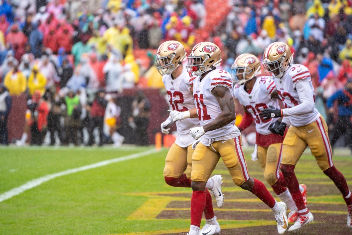 San Fransisco 49ers players run onto the field after a time-out. The 49ers were bested by the Kansas City Chiefs 20-31 during the 2020 Super Bowl. Photo courtesy of All-Pro Reels via Flickr