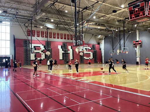 Students in the Bfit class are pictured playing basketball.
