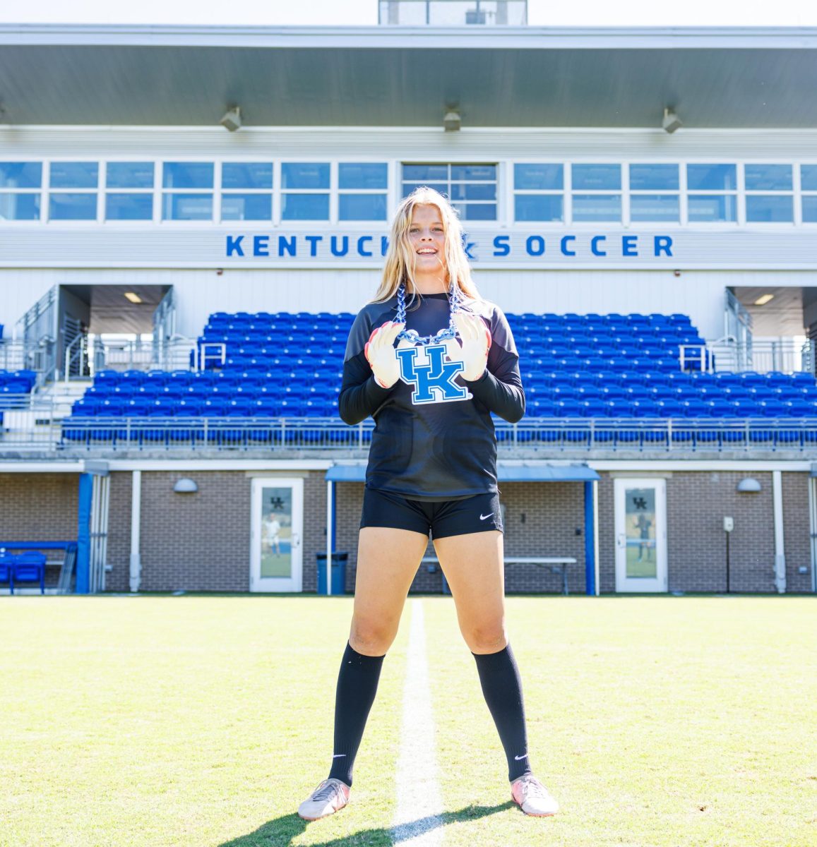 Senior Megan Holland poses on Kentucky’s women’s soccer field. Holland committed to Kentucky her junior year. Photo courtesy of Megan Holland ‘25.