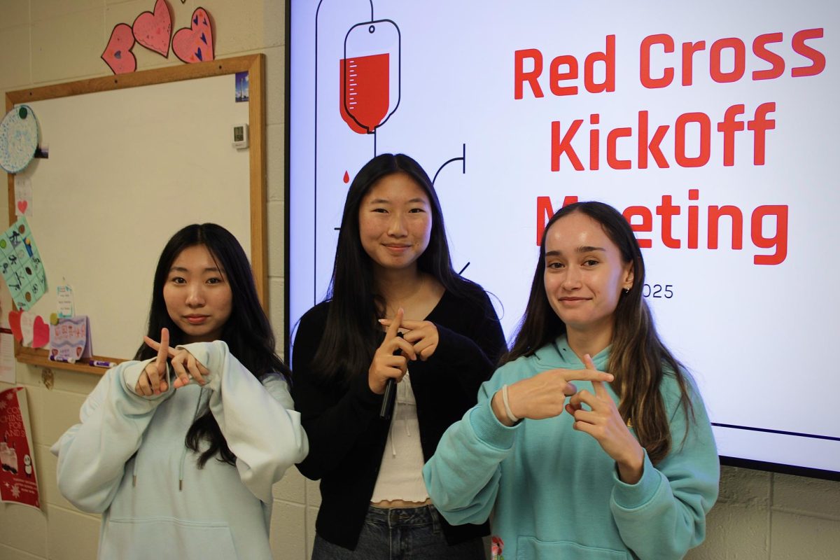 Teagan Tuesley ‘26, Stephanie Yoon ‘27 and Lena Park ‘27 directed the first red cross meeting. They presented club information to members, explaining important details about volunteering and future events. Photo taken by Alex Brudvik, ‘27.

