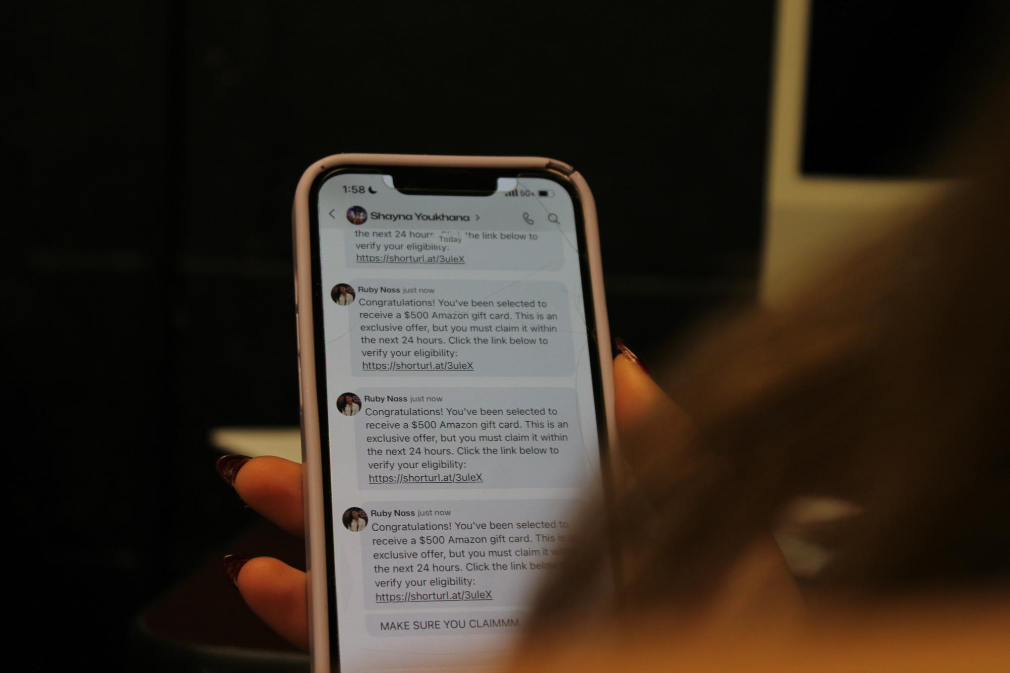 Student receives a spam text from GroupMe.