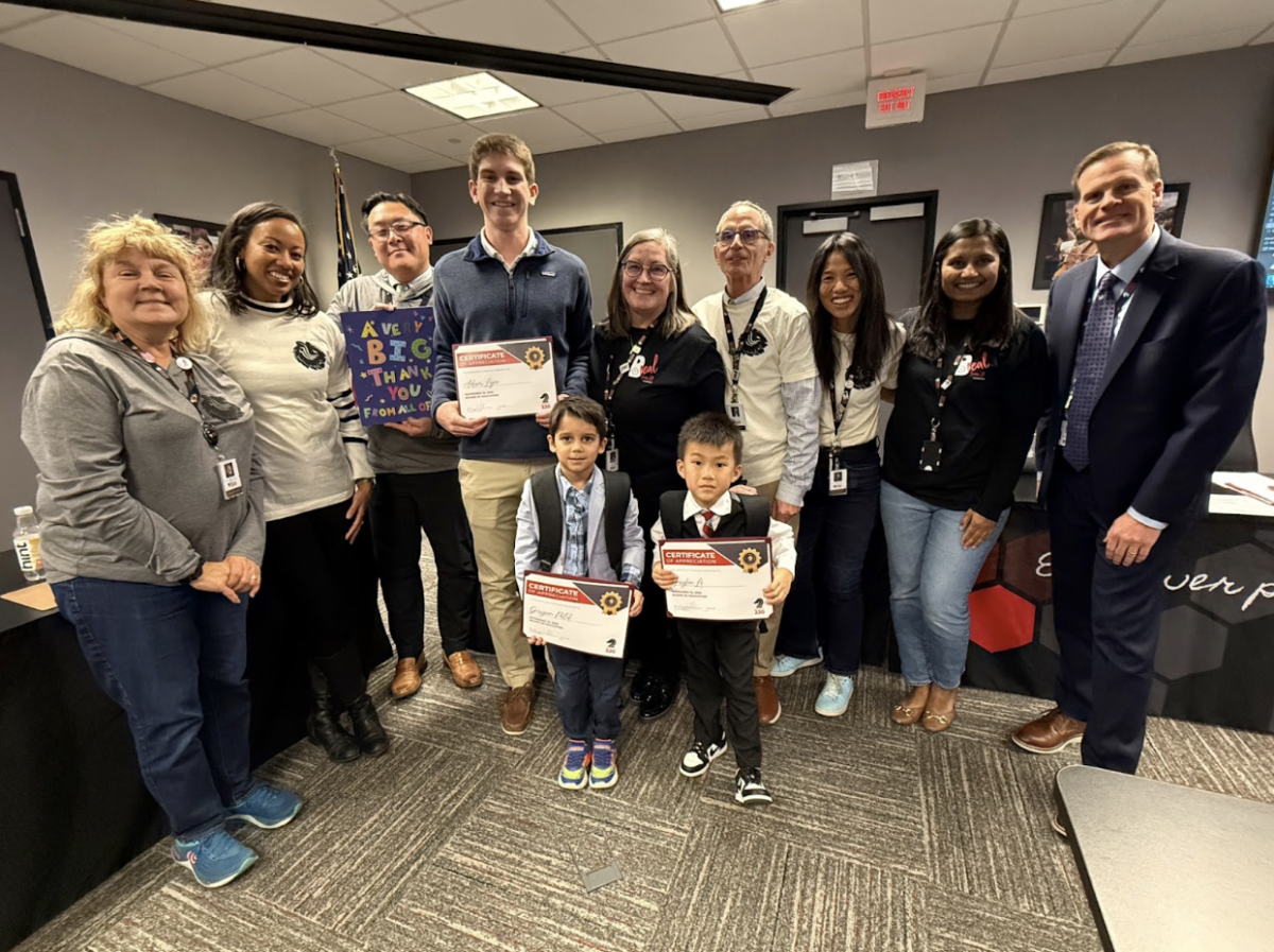 Lyon 26’, Jayden and Grayson display their certificates of appreciation while standing by Board members. Various awards/recognitions are given out during these board meetings to students and staff throoughout the district.