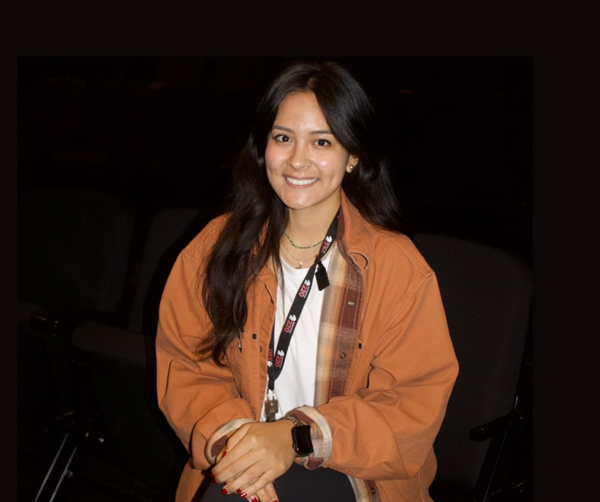 Ms. Lara in the black box theater, a place where she teaches classes and manages rehearsals. In this space she explores all the possibilities the theater has to offer. Photo by Ashley Carfora, '26.