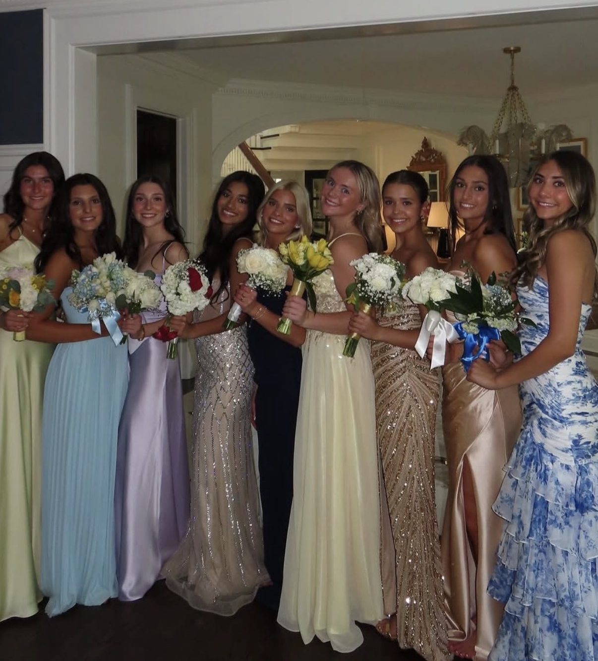 Seniors  Aanya Pareek, Saanvi Polavarpu, Emily Szarek, Jordan Silverberg, Kiki Tanking, Hailey Bartusek, and Nelly Shannon, pose for a group photo before heading off to dinner. 

