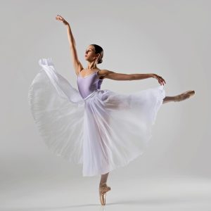 Myra Broderdorf, '28 performs an arabesque en pointe with her arms in first arabesque. Photo by Ron McKinney.